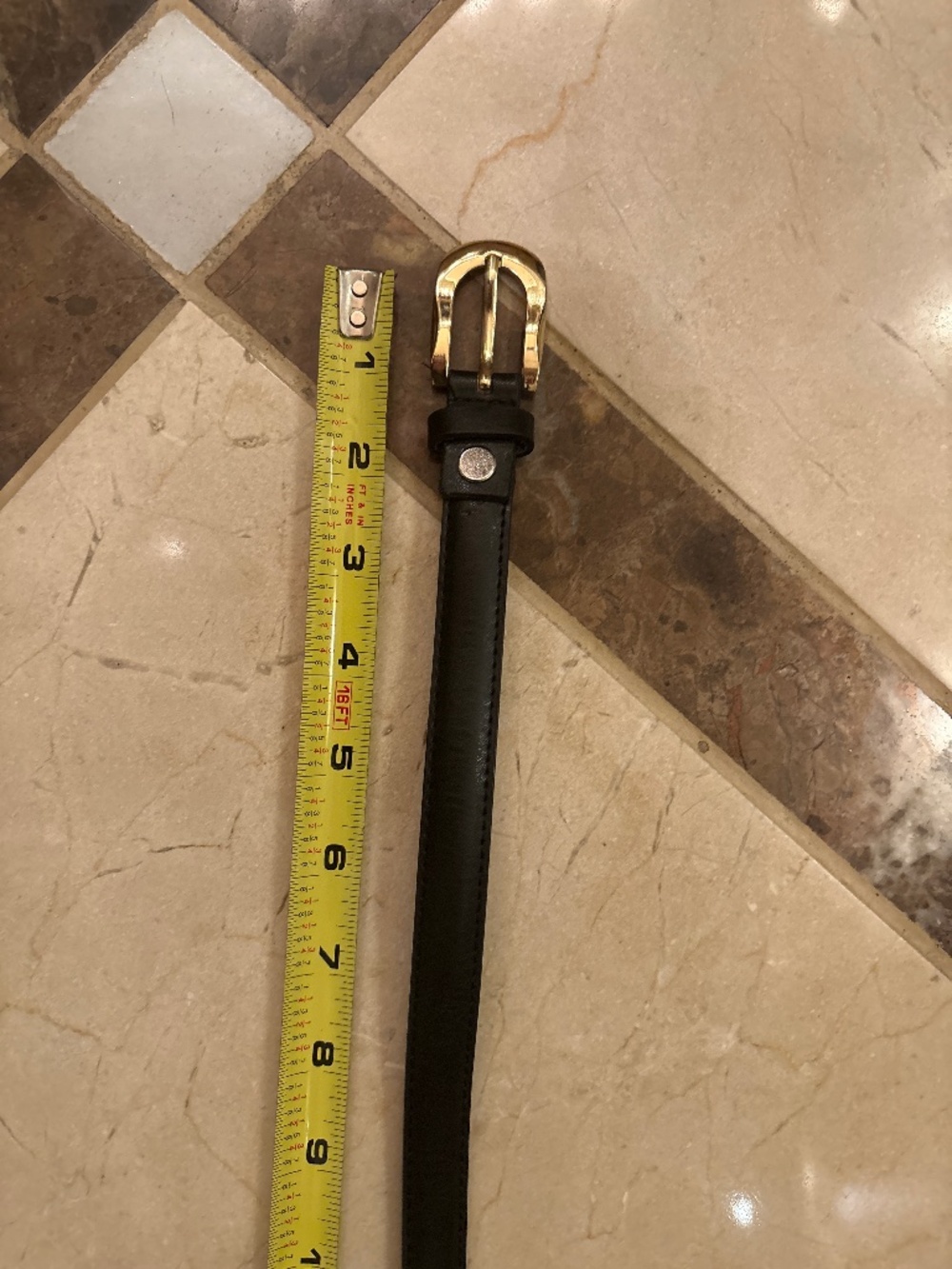 Women’s black leather belt with gold hardware